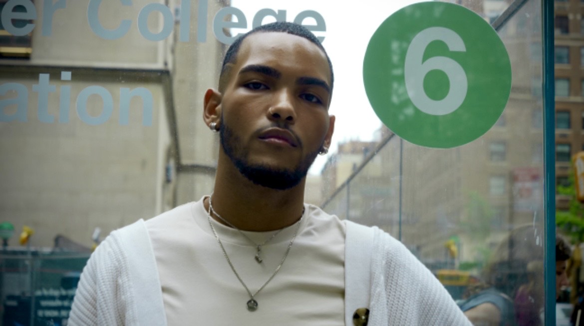 Portrait of Chris Rodriguez hanging out by the 6 train. Photography by Maxwell Cane. 