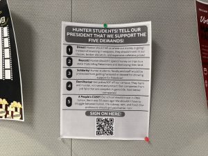 A flyer detailing the five demands created by the Gaza Solidarity Encampment with a QR code to sign the petition. It’s posted on the bulletin board of the Rockowitz Writing Center. 