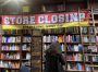 Store closing sign inside of Shakespeare &Co