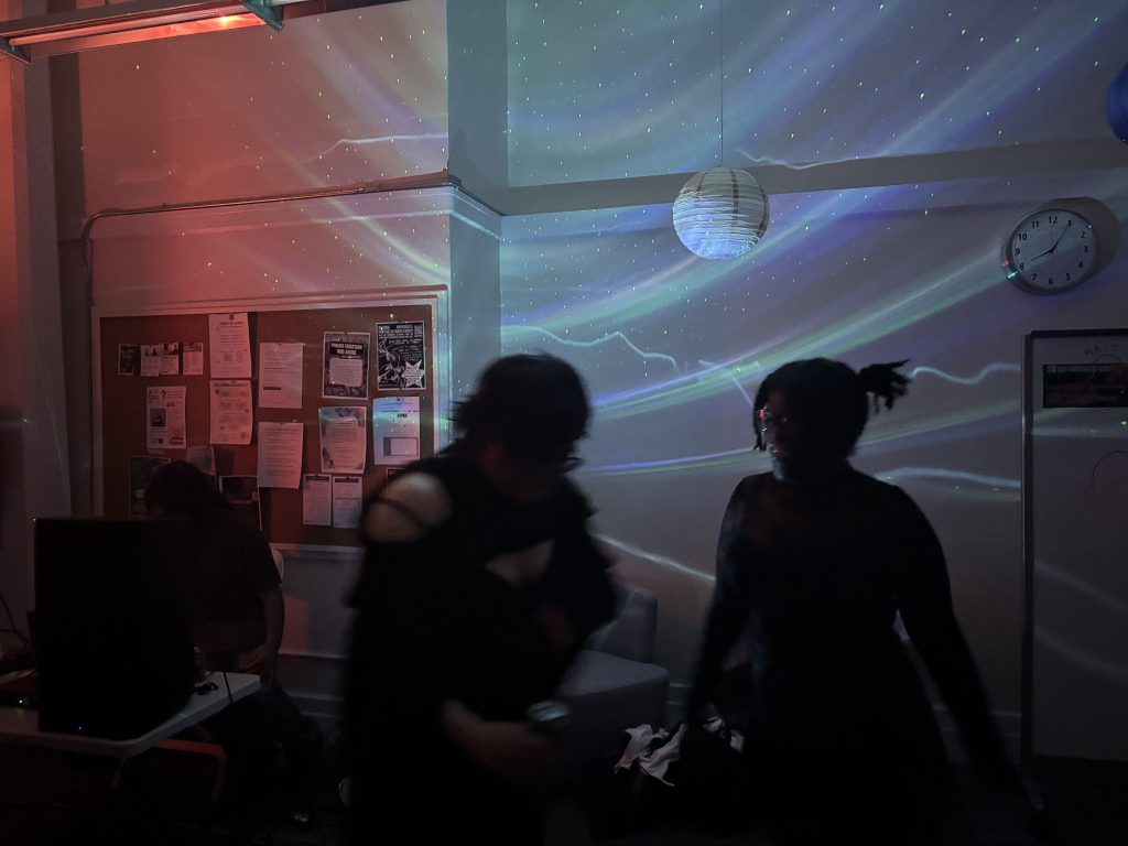 Joanna Ng (left) dancing with her friend, Max Watkins (right). (Anastasiia Poleva) April 25, 2025.
