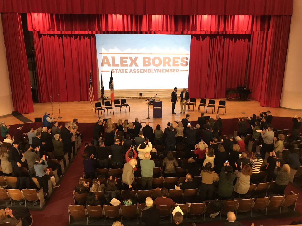 Assemblyman Alex Bores receives a standing ovation at his inauguration