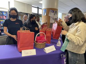 Hunter USG’s ‘Purple PEERiod Project’ Distributes Free Menstrual Products to Students