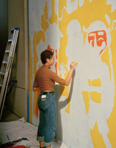 Women painting a wall