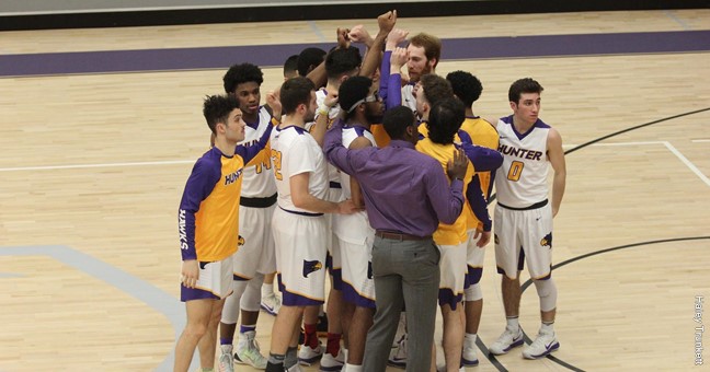 Hawks gather together in a team huddle.