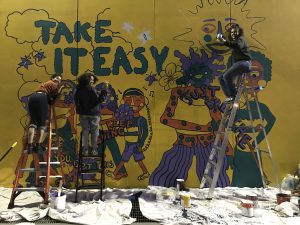 Women painting a mural